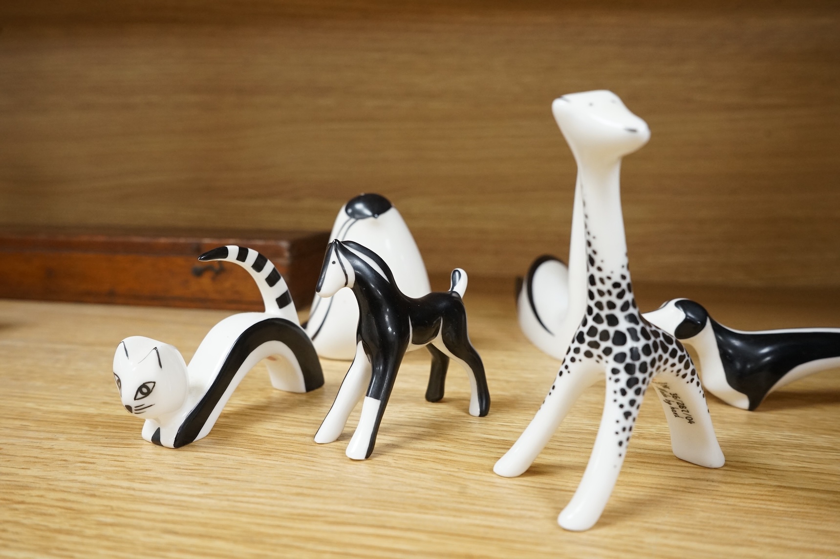 A collection of mid century Cmielow ceramic animals to include cat, rabbit and swan, largest 18cm in length